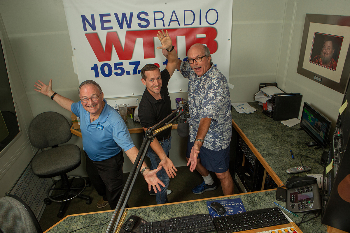 Disc Jockey Joe Tessier with radio personalities Elliott and Bob Soos