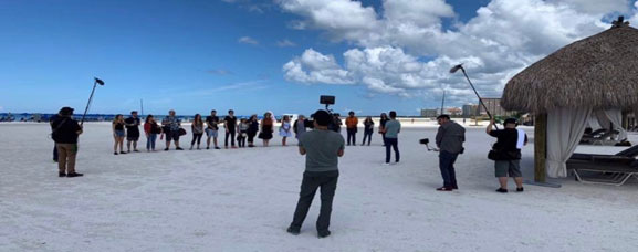 filmakers on a beachs shoot