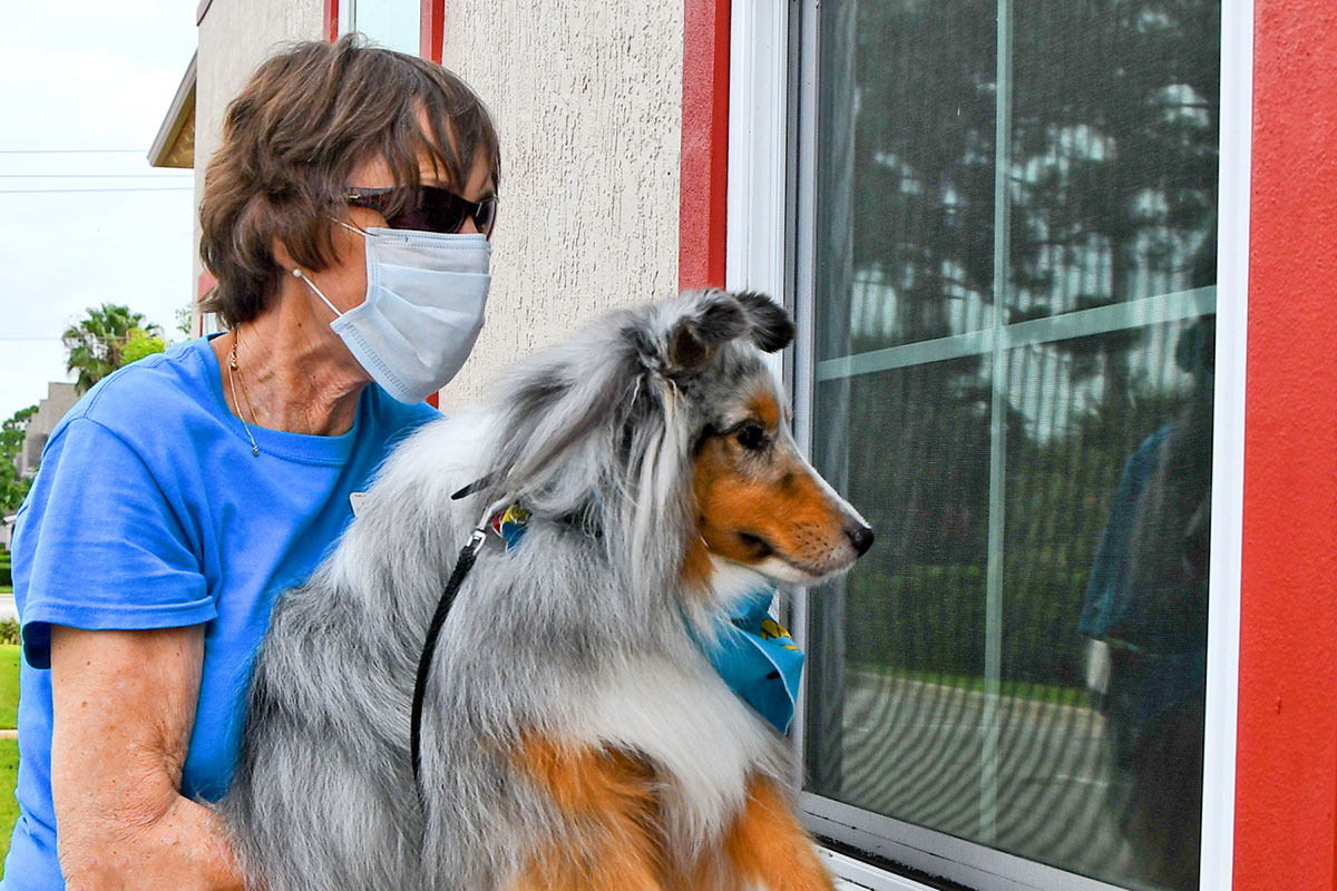 Sue Rice and her pet therapy dog, Enzo