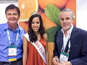 Nelson, Egan’s stepson and Bernard Egan & Co. president, left, poses with Miss Florida Citrus 2016, Stephanie Capon, and Jean Jacques Gilet, Egan’s son-in-law and director of the company’s citrus exports.