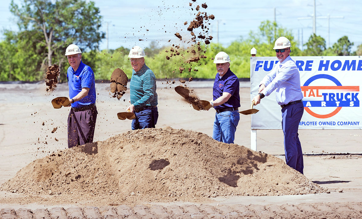Total Truck Parts executives, from left, Marc Karon, Tom Gibson, Leo Cordiero and Dennis Imbody wield shovels at the March ground-breaking ceremony for the company’s new 47,000-square-foot facility currently under construction on 6 acres at Midway Business Park in Port St. Lucie.