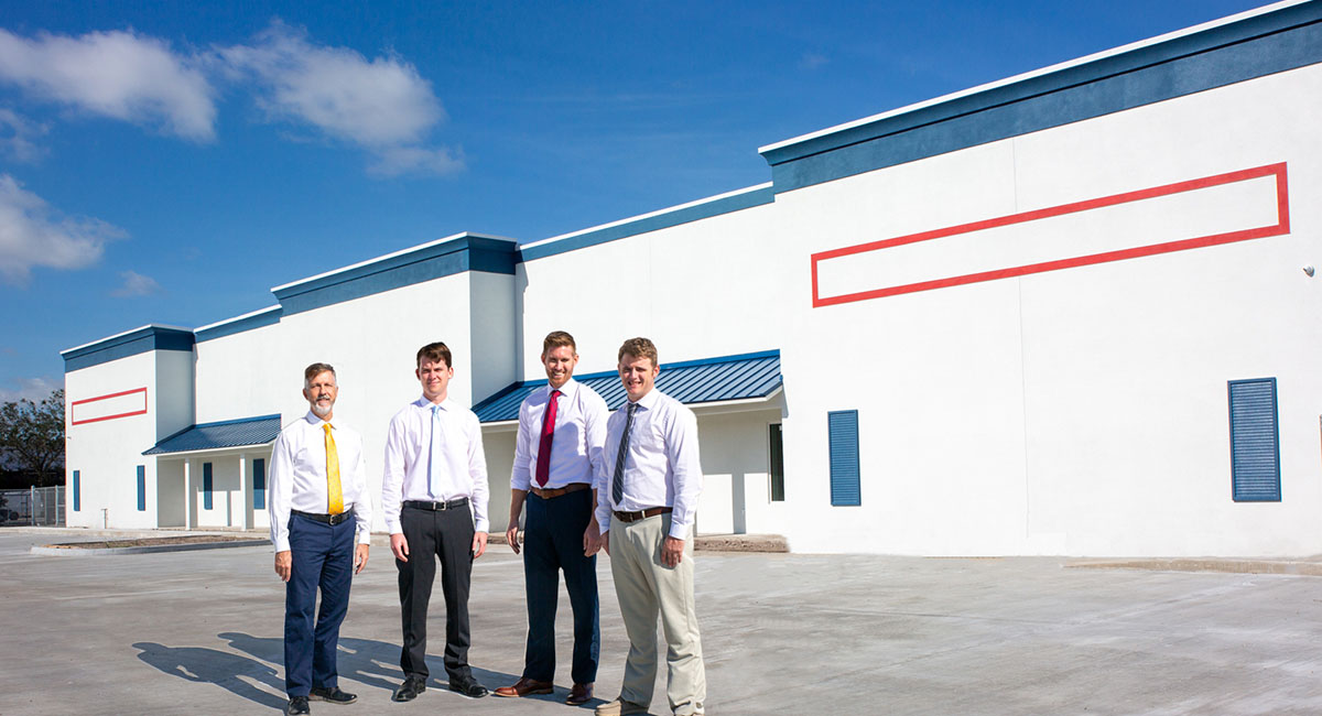 R. K. Davis Construction staff in front of the 46,800 s.f. Total Truck Parts building project in Port St. Lucie.