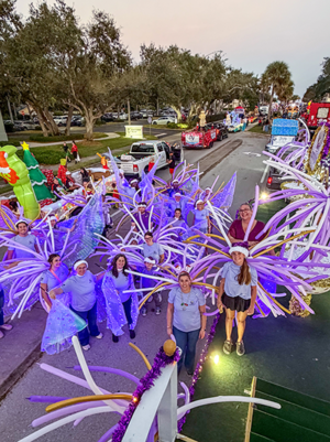 Hummingbird Care Services staff wear vibrant costumes